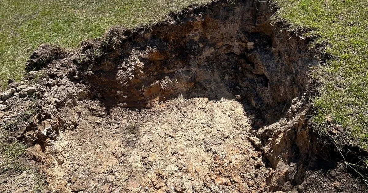 Exposed sand, clay, and limestone layers in an FGS exploratory test pit in Central Florida